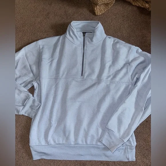 https://poshmark.ca/listing/Brandy-Melville-quarter-zip-sweater-65f5b41a9464f36f9c7e9a37